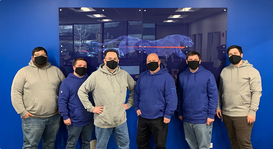 Company employees in masks